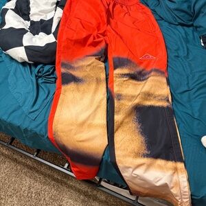 Cactus Jack by Travis Scott Red and Black Straight Leg Pants